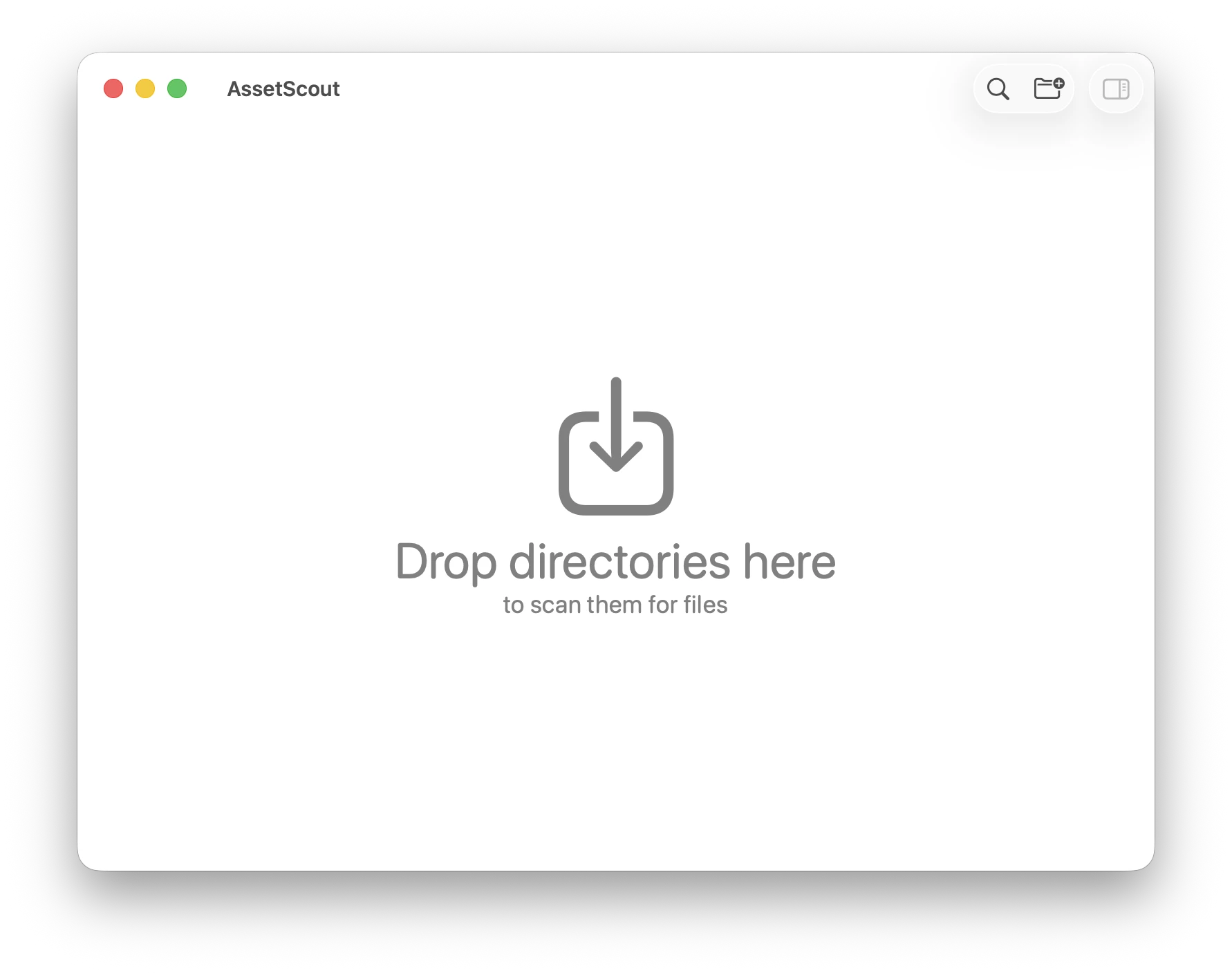 The empty AssetScout window, with a large downward arrow and the words Drop directories here, to scan them for files